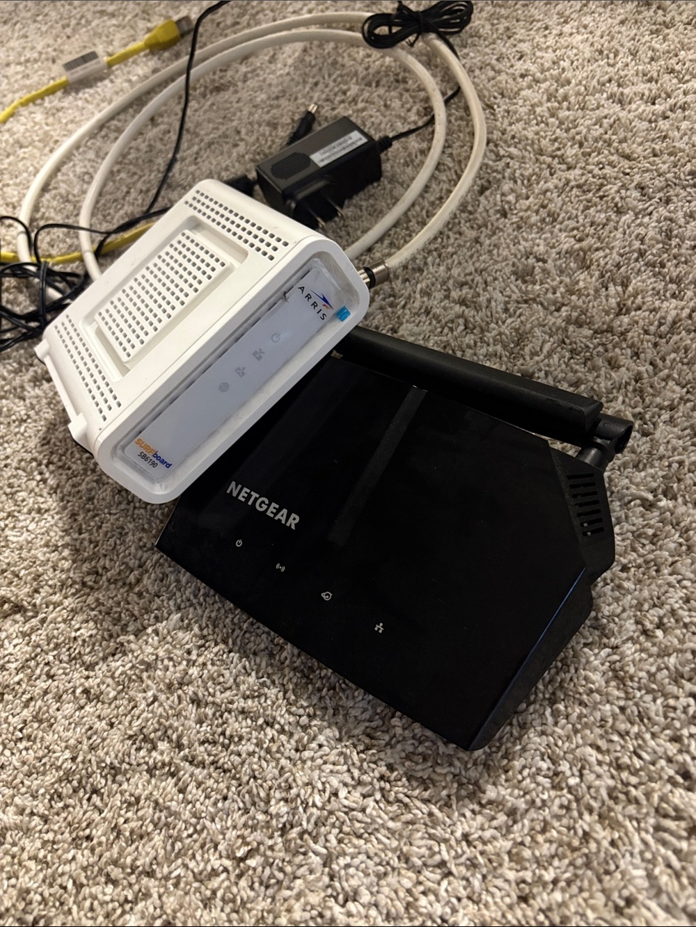 netgear Black Wireless Router with White Modem Unit